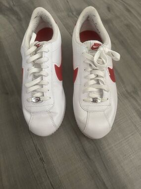Nike White Leather Sneakers with Red Swoosh